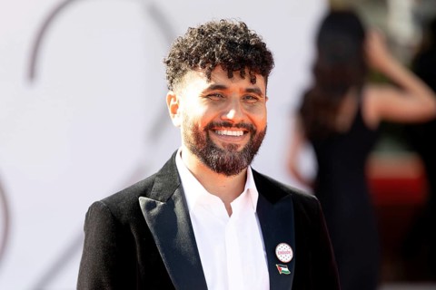 Venice, Italy - 3 September 2025: Amine Bouhafa wears a sticker in the colours of the Palestine