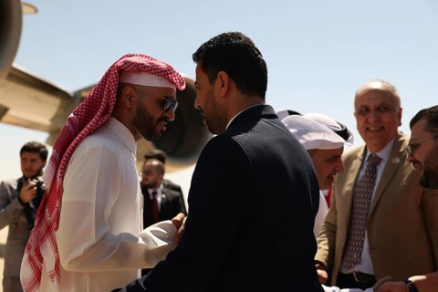 Syrian Health Minister Musab al-Omar welcomes a Qatari aircraft loaded with medical and