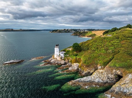 St Anthony Lighthouse from drone, Roseland peninsula, Head circular walk, Cornwall, UK
