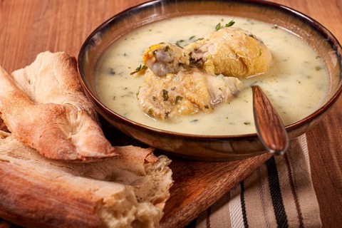 Chikhirtma chicken soup, Georgian dish, with lavash, top view, no people