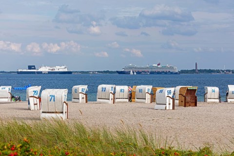 Cruise ship Mein Schiff 7, DFDS ferry, Laboe naval memorial, Kiel Fjord, beach chairs on the beach