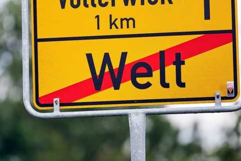 Town sign, traffic sign at the end of the village, end of the village world, inscription, village