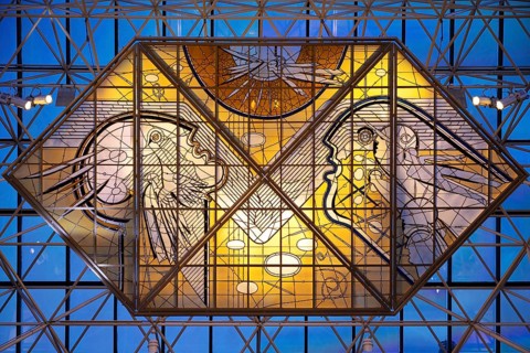 Stained glass artwork entitled Icarus, one of two glass artworks by Leifur Breidfjörd at Keflavik