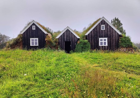 Nyibær, a medium-sized farmhouse with a sod roof, now a museum, Holar, Iceland