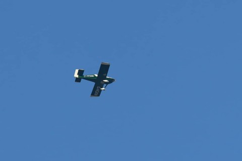 Van's RV-9 light aircraft flying in a blue sky, England, United Kingdom