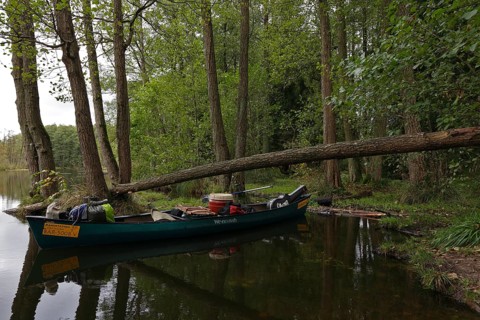Canoe by nature photographers in Drosedower Bek, Müritz National Park, Mecklenburg-Western