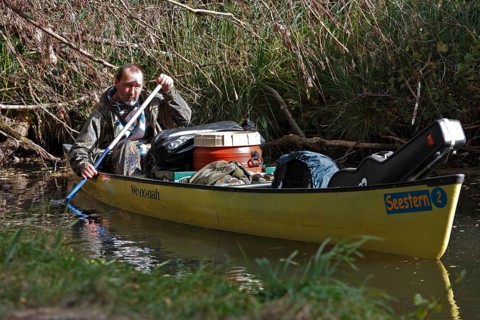 Canoeists in a canoe, Müritz National Park, Mecklenburg-Western Pomerania, Germany