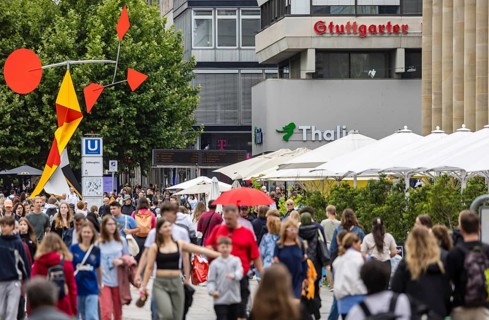 Crowd on the way in the shopping street. Königstraße pedestrian zone in Stuttgart,