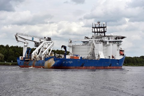 Cable carrier, sea cable carrier, ship, vessel, specialised ship, NKT VICTORIA sails in the Kiel