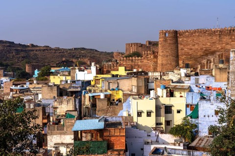 Mehrangarh Fort, above colourful houses, Blue City, Gulab Sagar, Jodhpur, Rajasthan, India