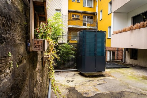 Heat pump in a backyard in Wuppertal, Germany, digitally reworked