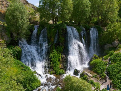 Several waterfalls surrounded by dense greenery and trees, aerial view, Shaki waterfall, Shaki,