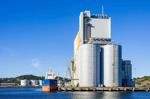 Industrial harbour structures and cargo ship NELLI in the port of Uddevalla, Bohuslän, Västra