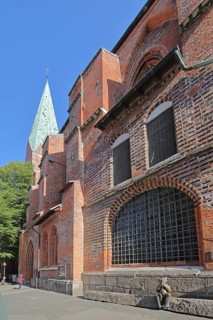 St Mary's Church and Devil by Rolf Goerler 1999, bronze sculpture, Brick Gothic, Brick church,