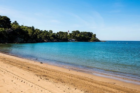 Picturesque beach and lighthouse, Plage de La Baumette, Saint-Raphaël, Massif de l'Esterel, Esterel