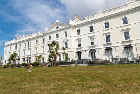 Historic terrace houses built c 1860s overlooking Plymouth Sound, Grand Parade, West Hoe, Plymouth,