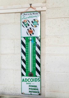 Wall thermometer advertising Duckhams Adcoids engine oil 1930s, on display at auction, UK