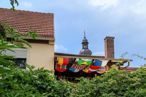 International flags stretched on a balcony, Bavaria, Germany