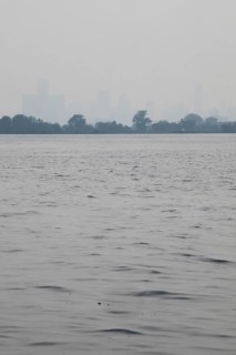 Detroit, Michigan USA - 4 August 2025 - Smoke from Canadian wildfires nearly erases the downtown