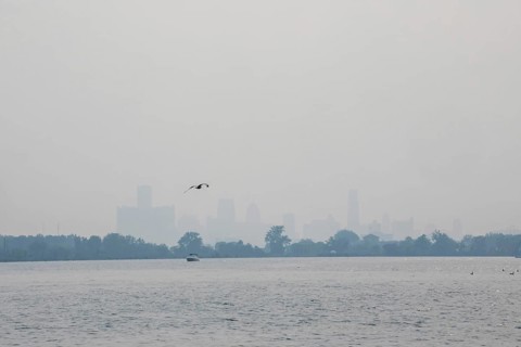 Detroit, Michigan USA - 4 August 2025 - Smoke from Canadian wildfires nearly erases the downtown