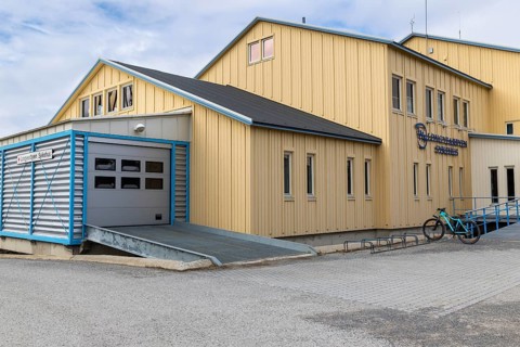 Hospital, yellow wooden house, Longyearbyen, Spitsbergen, Svalbard