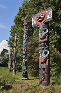 Totem poles, Chief Skedans Mortuary Totem Pole and Ga'akstalas Totem Pole, Stanley Park, Vancouver,