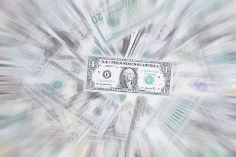 Various US dollar notes in a pile, banknotes, zoom effect