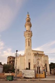 Mosque with minaret at sunrise, Esna, Egypt