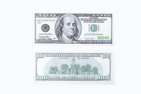 100 US dollar note, 100 dollar banknotes on white background
