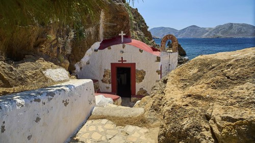 Legend, Crab, Mussel fisherman, Beautiful chapel on the rocky Mediterranean coast in sunny weather,