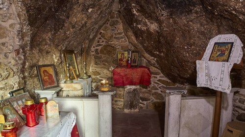 Legend, Crab, Mussel fisherman, Small chapel interior with candles and religious icons on a stone