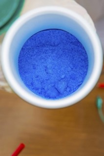 Close-up of a container with blue powder in a laboratory, Battery Research, Nagold, Germany