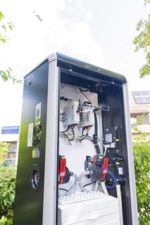 Open-air power installation next to a building and in the open air, installation of a charging