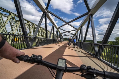 Ride over the De Massover cycle path bridge, over the Meuse south of Nijmegen, near Cuijk, part of