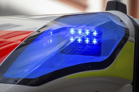 Close-up of a flashing blue light on an ambulance