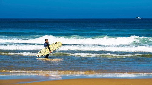 Surfer on Contis beach, Saint Julien en Born, Saint-Julien-en-Born, Landes, France