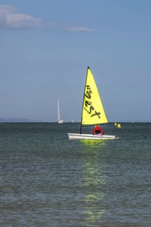 Boats on sea over Knoll Beach Studland, Poole, Dorset, England, United Kingdom