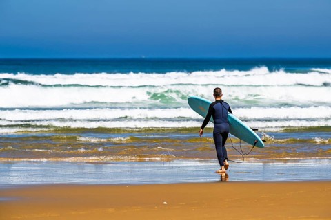 Surfer on Contis beach, Saint Julien en Born, Saint-Julien-en-Born, Landes, France