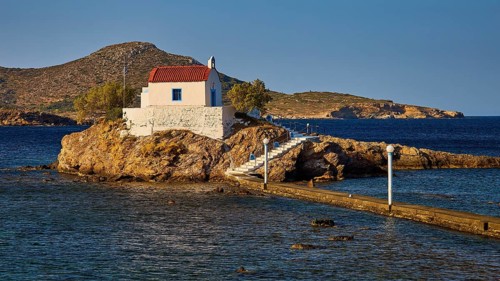 Chapel on rock in the warm morning light, surrounded by calm sea, Chapel, Church, Agios Isidoros,