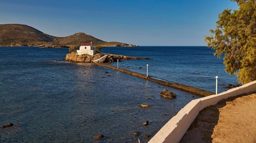 Small chapel on rock, surrounded by trees, in quiet morning light, chapel, church, Agios Isidoros,