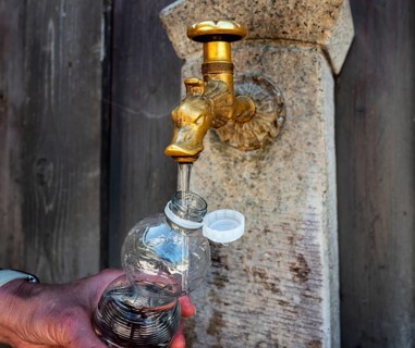 Drinking water supply at a public well, Bavaria, Germany