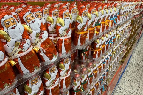 Huge large shelf with chocolate Santa Claus chocolate Santa Claus chocolate Santa Claus chocolate