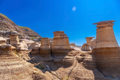 Breathtaking view of the otherworldly hoodoo rock formations in drumheller, alberta, canada,