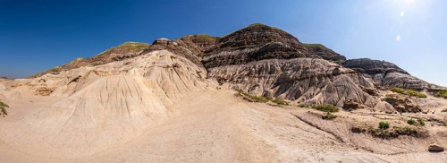 Breathtaking panorama showcasing unique geological formations, known as hoodoos, rising from arid