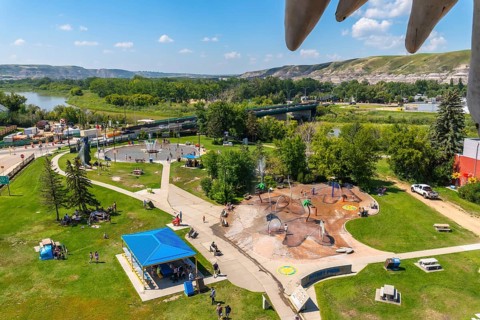 Drumheller city park offers a refreshing escape with splash parks, picnic areas, and a dinosaur