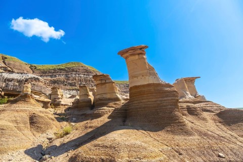 Breathtaking sandstone hoodoos rise majestically in drumheller valley, showcasing unique geological