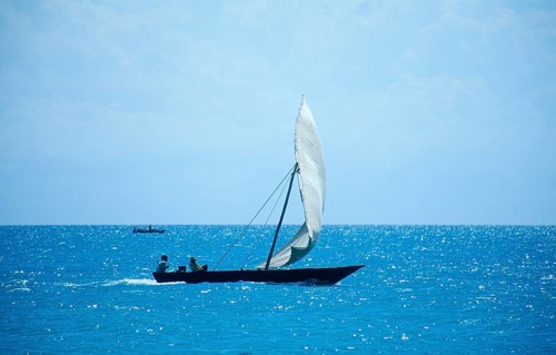 Traditional dhow off Zanzibar Town, Zanzibar, Tanzania, Africa, June 2000, vintage, retro, old,