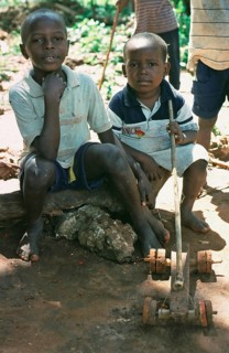 Children with homemade toys, Zanzibar, Tanzania, Africa, June 2000, vintage, retro, old, historical