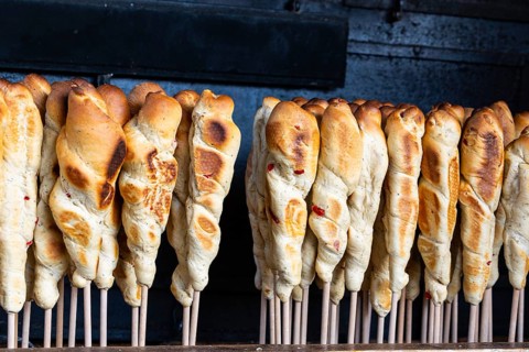 Stockbrot, Christmas market, city of Esslingen, district of Esslingen, Baden-WÃ¼rttemberg, Germany