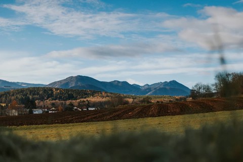 Extensive landscape with mountains in the background under clear blue sky, Ternitz, Lower Austria,